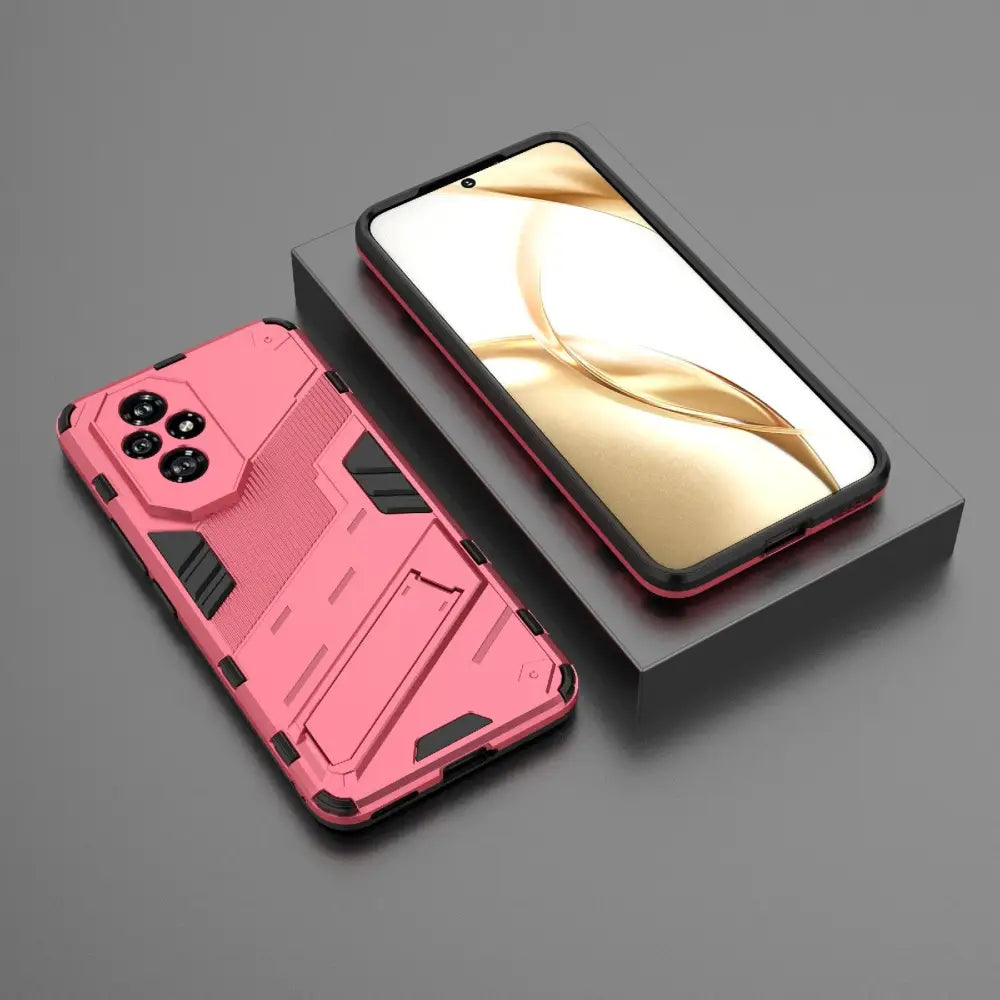 Vaaleanpunainen armor suojakotelo kera jalustalla älypuhelimen vieressä